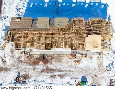 Aerial Drone View Of A Multifamily Apartment Complex Under Construction.