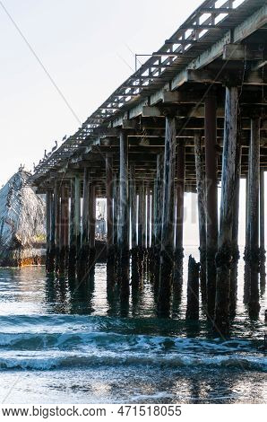 Exterior Shot Of The Wooden Support Structure That Carries The Sea Cliff Pier Near Aptos, California