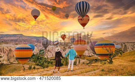 Cappadocia Turkey During Sunrise, Couple On Vacation In The Hills Of Goreme Capadocia Turkey