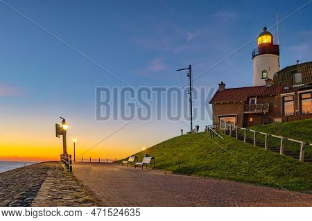 Urk Flevoland Netherlands Sunset At The Lighthouse And Harbor Of Urk Holland. Fishing Village Urk