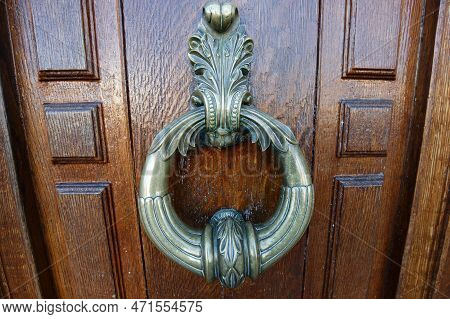 European Vintage Old Metal Wrought Iron Door Knocker. Design Detail. Paris.