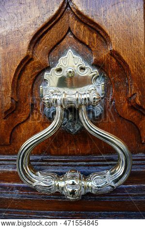 European Vintage Old Metal Wrought Iron Door Knocker. Design Detail. Paris.