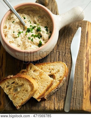 Sour Cream, Yogurt And Caramelized Onion Spread Dip In The Bowl On Wood Board Bread Pieces Are Near 