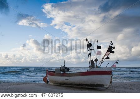 Fishing Boat On The Beach Of The Polish Baltic Coast Near Rewal