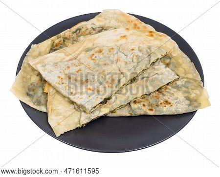 Tatar Cuisine - Yantik With Herbs And Cheese (stuffed Grilled Turnover) On Black Plate Isolated On W