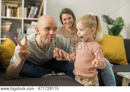 Cochlear Implant System. Installation Cochlear Implant On Child Girl Ear For Restores Hearing. Kid H