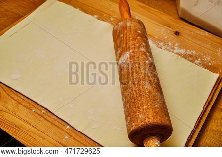 Preparing Puff Pastry Dough With Roller For Apple Strudel