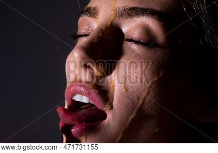Sexy Girl With A Honey Facialmask Closeup. Beautiful Sensual Woman With Honey On Her Face. Healthy P