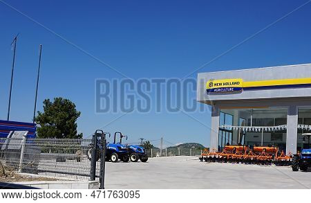 Araclar, Turkey - September 16, 2022: New Holland Agriculture Logo In The Dealership Store Against A