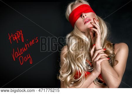 Sexy Blonde Woman Model With Red Lips And Covered Eyes On Black Background. Erotic Concept.