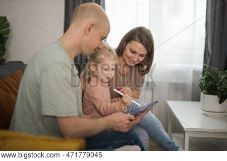 Cochlear Implant System. Installation Cochlear Implant On Child Girl Ear For Restores Hearing. Kid H