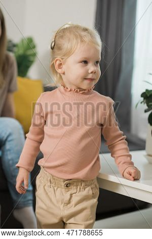 Deaf Child Girl With Cochlear Implant Studying To Hear Sounds - Recovery After Cochlear Implant Surg