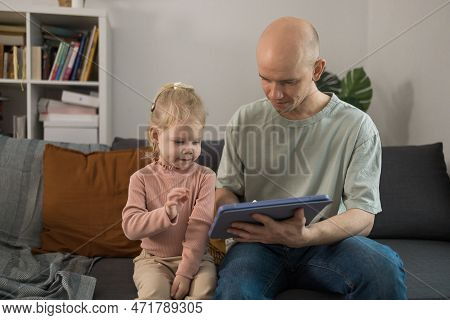 Deaf Child Girl With Cochlear Implant Studying To Hear Sounds And Have Fun With Father - Recovery Af