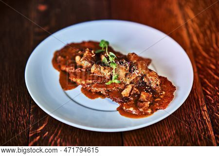 A Fried Potato Pancakes With Gulasch Sauce