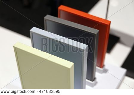 Samples Of Different Colors On A Plastic Plan In A Shop.
