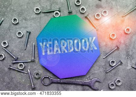 Conceptual Caption Yearbook. Word Written On Publication Compiled By Graduating Class As A Record Of