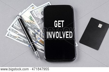 Credit Card And Text Get Involved On A Smartphone With Dollars And Pen. Business Concept