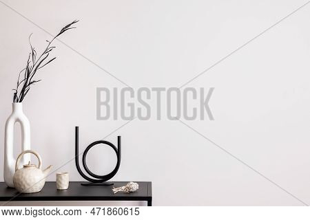 Aesthetic Interior Of Living Room With Copy Space, White Wall, Black Table, Candlestick, Vase With D