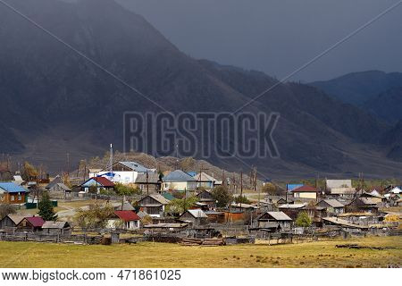 Russia. The South Of Western Siberia, The Altai Mountains. The Village Of Tenga, Illuminated By The 