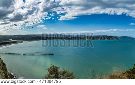 Overlooking The Historic Tolaga Bay Wharf From The Captain Cook Walkway High Up On The Cliff