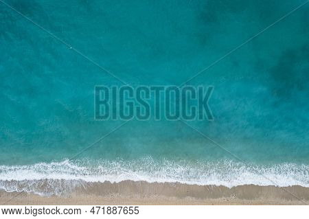 Straight Down View On Waves And Shore Of Small Stones By Bunec Beach Area In Summer 2022, Albania
