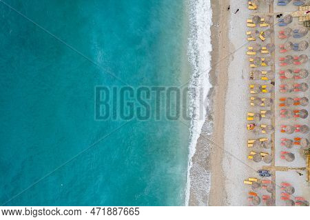 Straight Down View On Parasols And Beach By Bunec Beach Area In Summer 2022, Albania