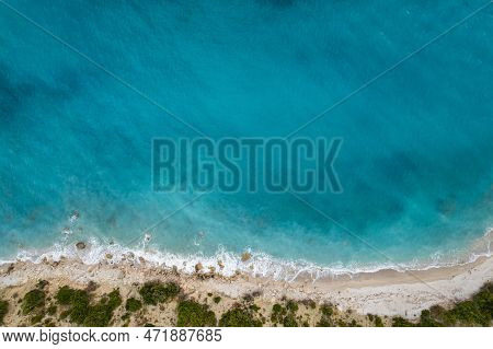 Straight Down View On Waves On Rocky Shore By Bunec Beach Area In Summer 2022, Albania