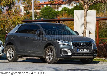 Side; Turkey - January 23 2023:     Black Audi Q2  Is Parked  On The Street On A Warm  Day