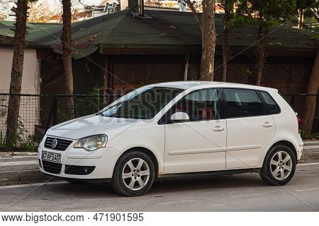 Side, Turkey -january 24, 2023:   White Volkswagen Lupo  Parking On The Street On A Warm Summer Day 