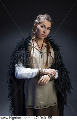 An Authoritative, Self-confident Woman In A Viking-style Fantasy Costume. Skirt With Shirt And Long 
