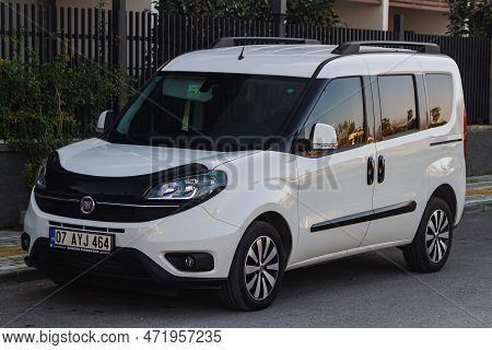 Side, Turkey -january 23, 2023:   White  Fiat Duplo   Is Parked  On The Street On A Warm Summer Day 