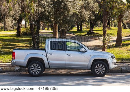 Antalya,  Turkey - March 04 2022:  Silver Volkswagen Amarok Is Parked  On The Street On A Warm  Day 