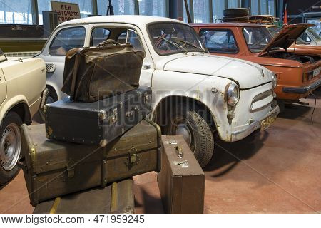Zelenogorsk, Russia - January 27, 2023: A Bunch Of Old Suitcases Against The Background Of The Sovie