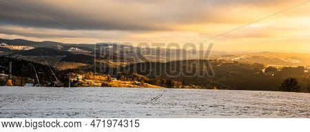 Panoramic View Of Winter Mountain Landscape In The Evening. Paseky Nad Jizerou, Giant Mountains, Cze