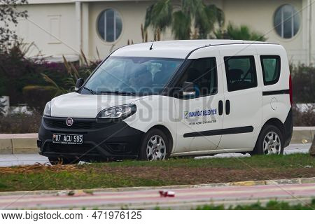 Side , Turkey -  January  27, 2023:  White Fiat Doblo Driving In The City