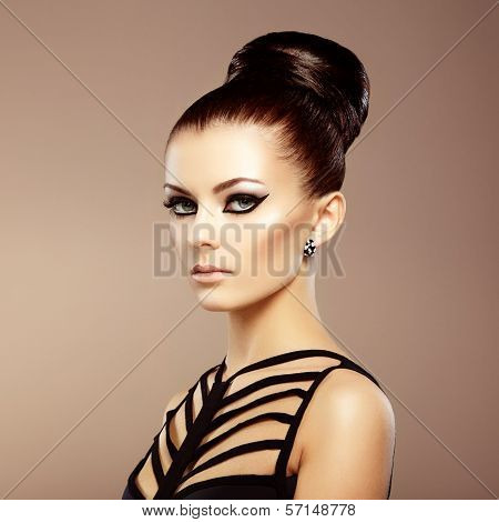 Portrait Of Beautiful Sensual Woman With Elegant Hairstyle.  Perfect Makeup