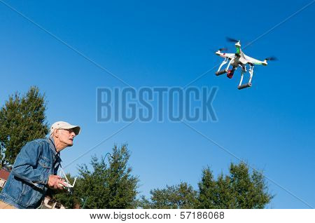 Man Controlling A Drone