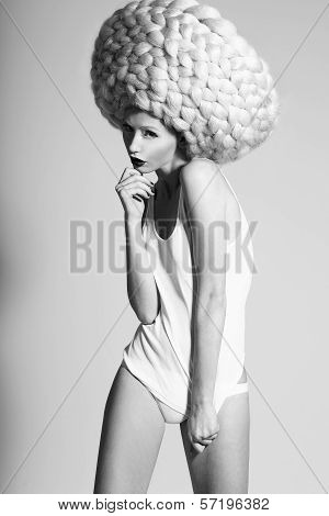 Glamor. Image Of Fashion Model In Unusual Wig In Artistic Pose