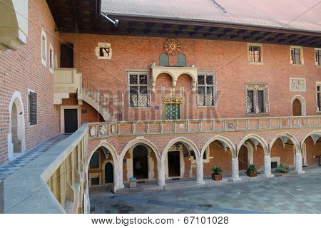 KRAKOW, POLAND - SEPTEMBER 15, 2013: Gallery and courtyard of Collegium Maius, the oldest building of Jagiellonian University. Founded in 1364, it's the oldest university in Poland