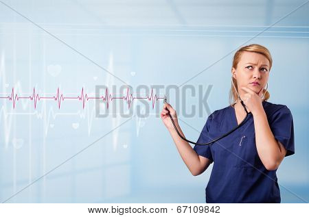 Pretty young medical doktor listening to red pulse and heart rates