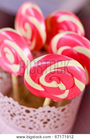 spiral pink sugar lollipops