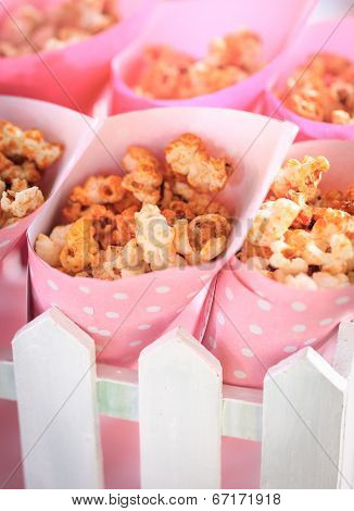 Popcorn in the pink bucket