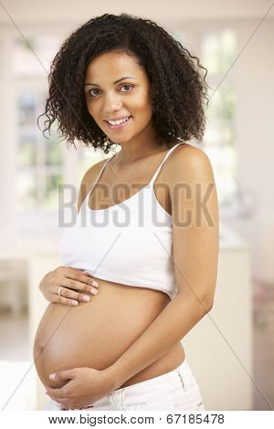 Pregnant woman at home