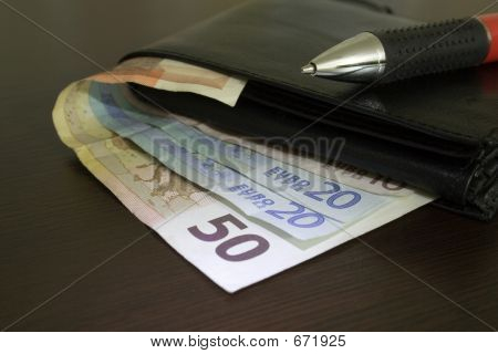 Euro Bills On Table