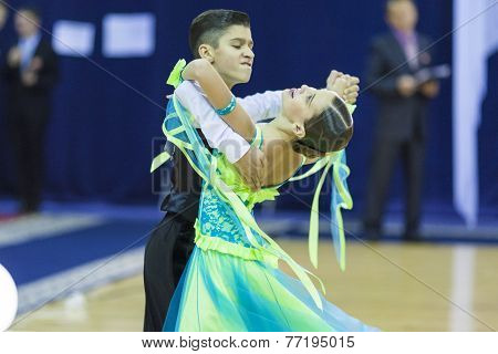 Minsk-belarus, October 4,2014: Unidentified Dance Couple Performs Juvenile-1 Standard European Progr