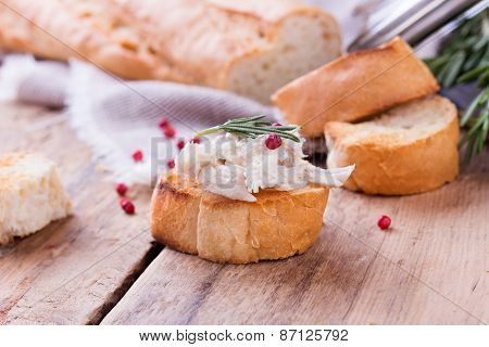Toast Bread With Chicken Pate On Wooden Desk.