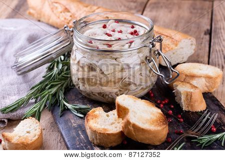 Chicken Pate In Glass Jar And Toast Bread On Rustic Kitchen Board