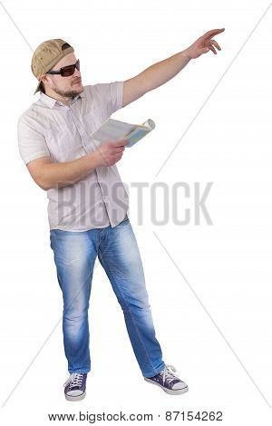 Man with guide book in a hand on white background