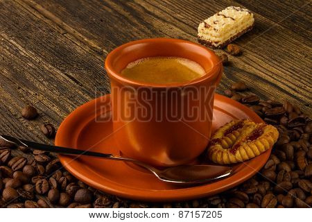 Cup Of Coffee, Sweet And Coffee Beans