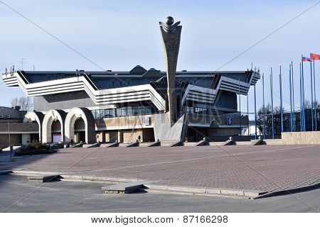 ST. PETERSBURG, RUSSIA - MARCH 6, 2015: People near the Lenexpo exhibition center pavilion 6. Found in 1968, Lenexpo is one of the largest exhibition centers in Russia